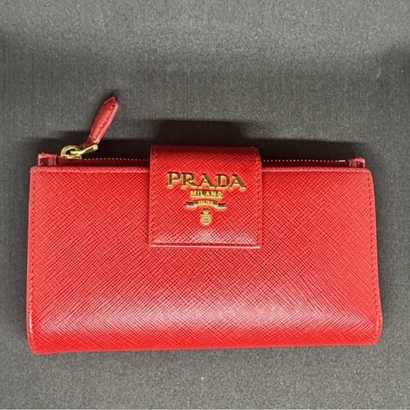 Prada Handbags - Prada Red Leather Compact Zippy Wallet W/ COA